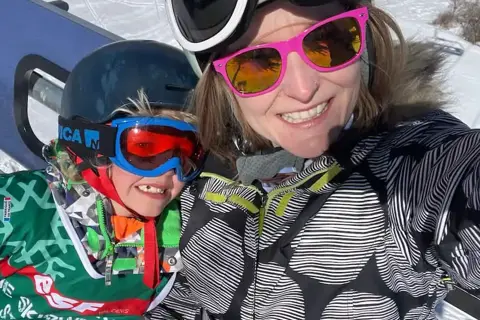 Nicola From The Peak Retreats Team On A Chairlift With Her Son (1)